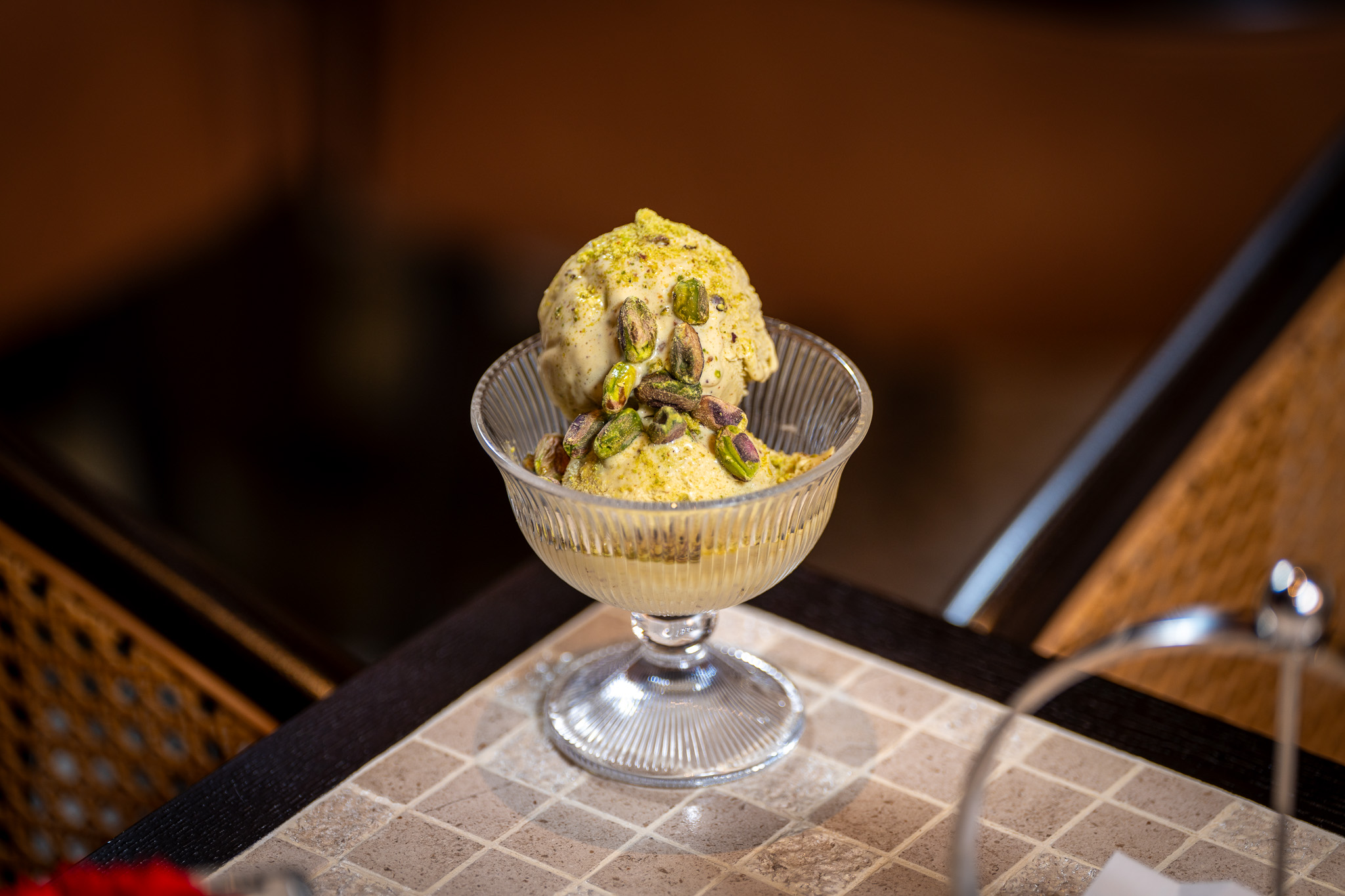 Smooth and nutty gelato with a delicate roasted pistachio flavor, offering a rich, earthy, and subtly sweet experience.